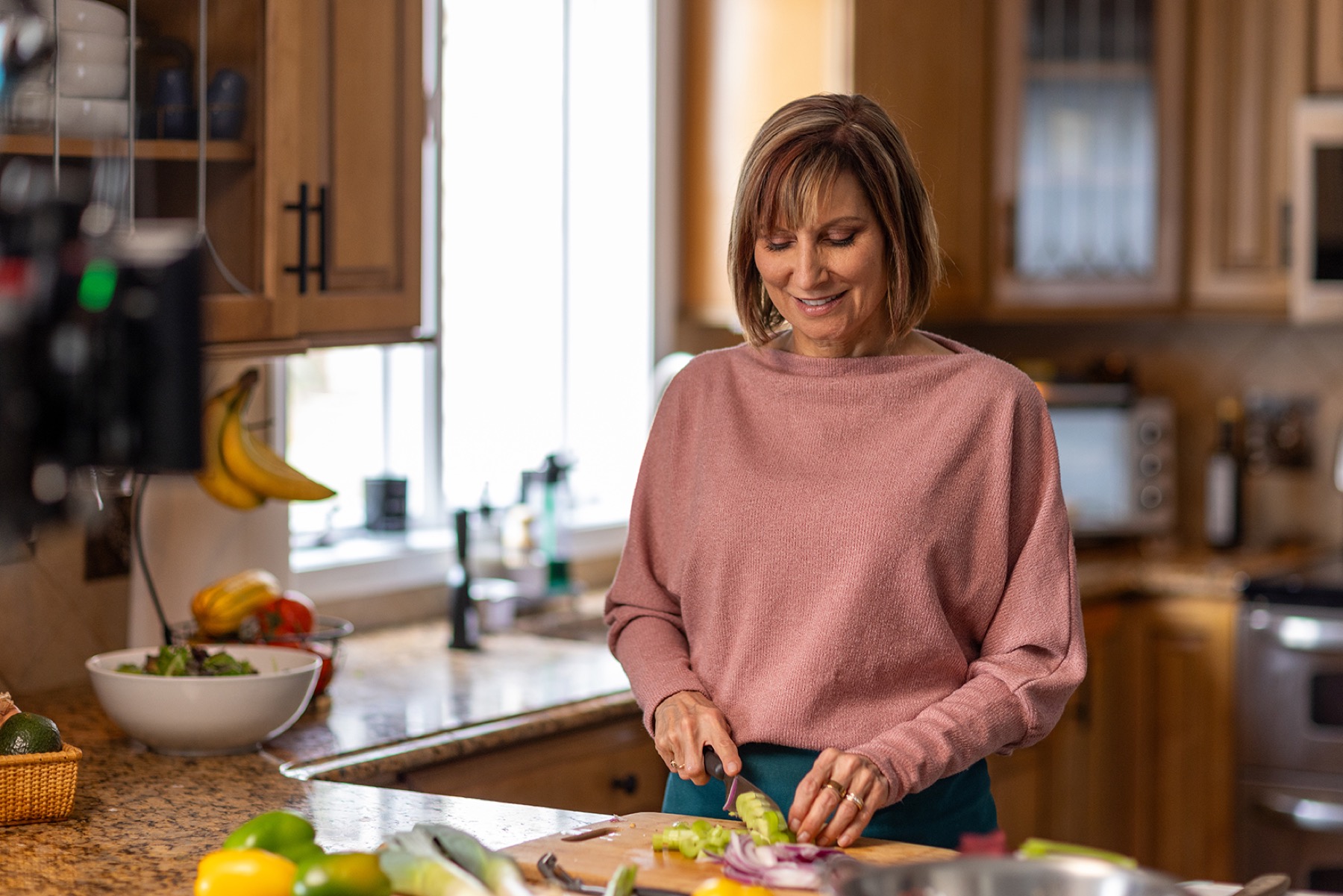 Kerry cooking in a kitchen